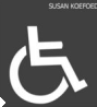 Símbolo con la figura de una persona en silla de ruedas. Imagen en blanco sobre fondo gris